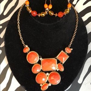Orange beaded earring and orange necklace
